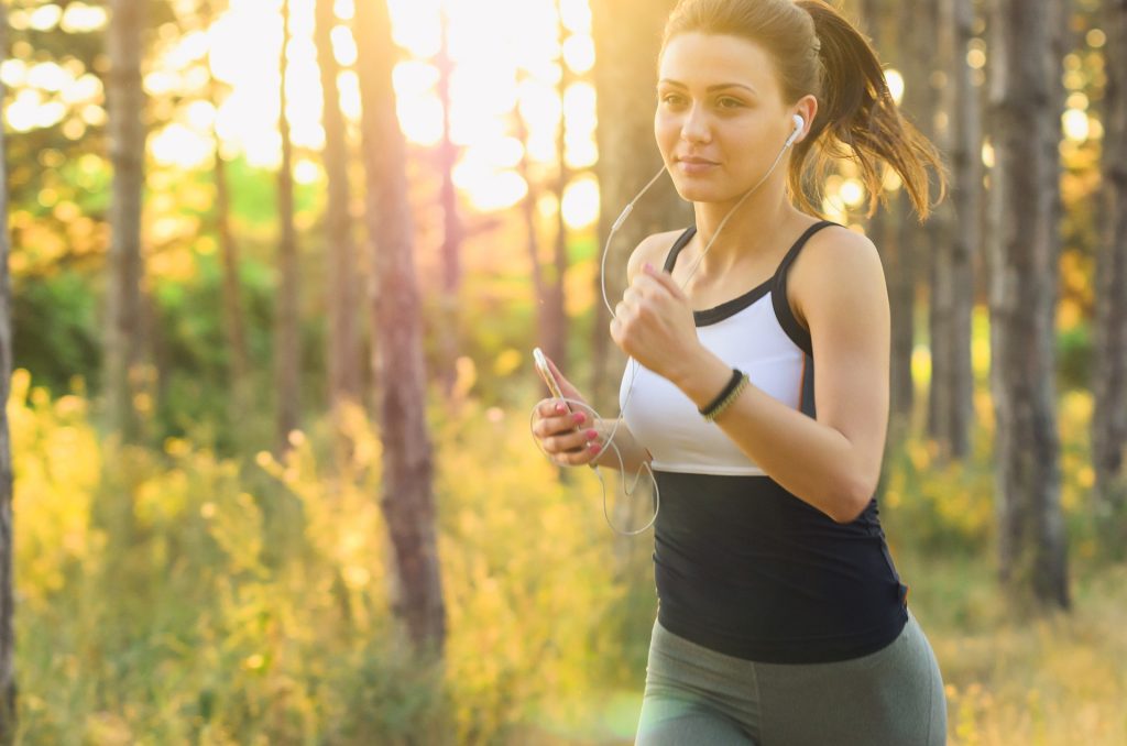 Woman running to help build strong bones